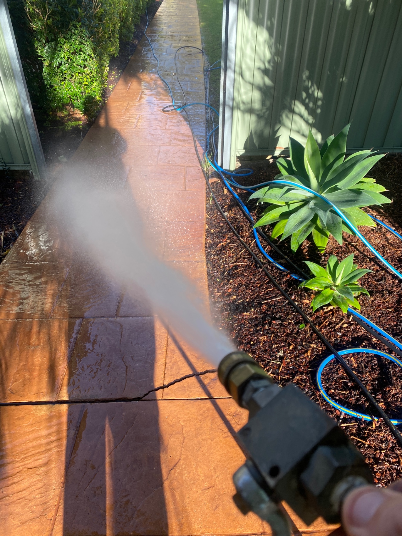 Pressure washing a stamped concrete side path in Lysterfield South, Victoria — Bluewater Pressure Washing